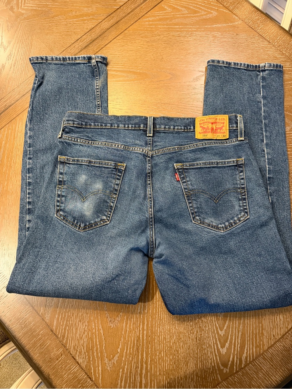 Levi's Straight Leg Blue Denim Jeans with Classic Back Pockets